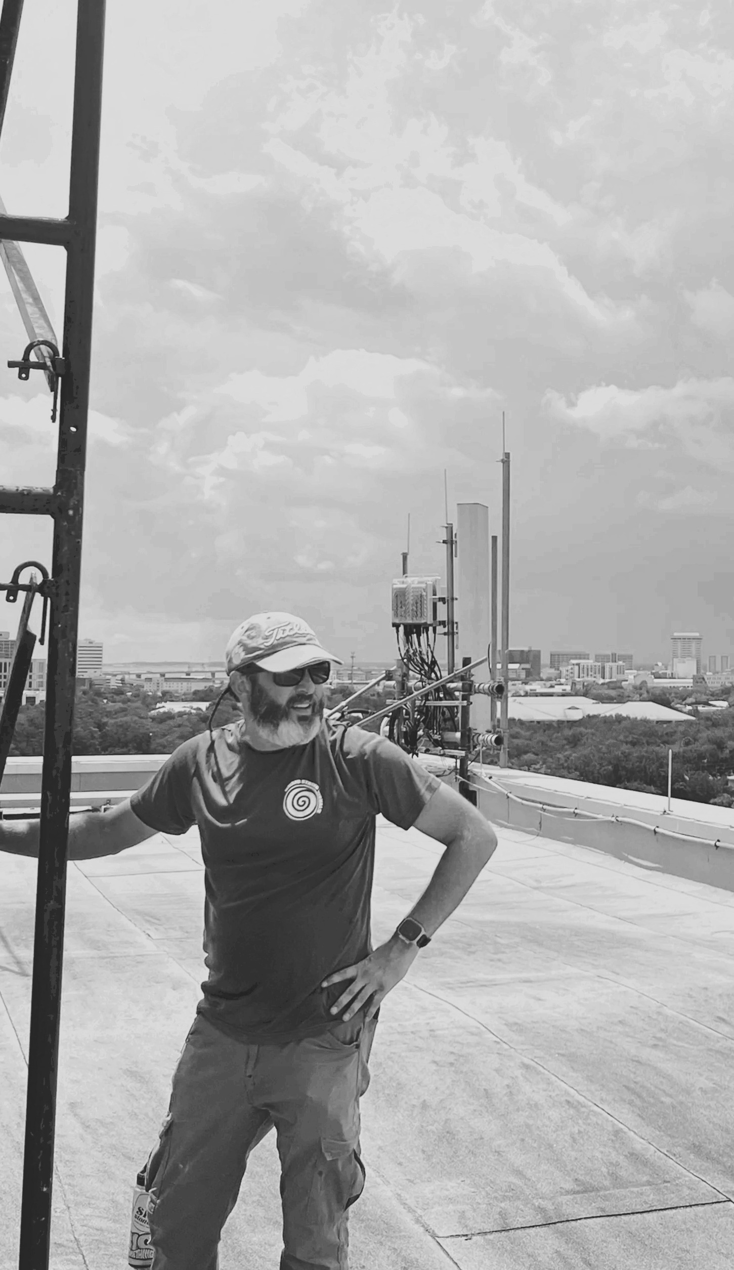 Nick Bruno, owner of Grand Strand Visuals, on a rooftop job site