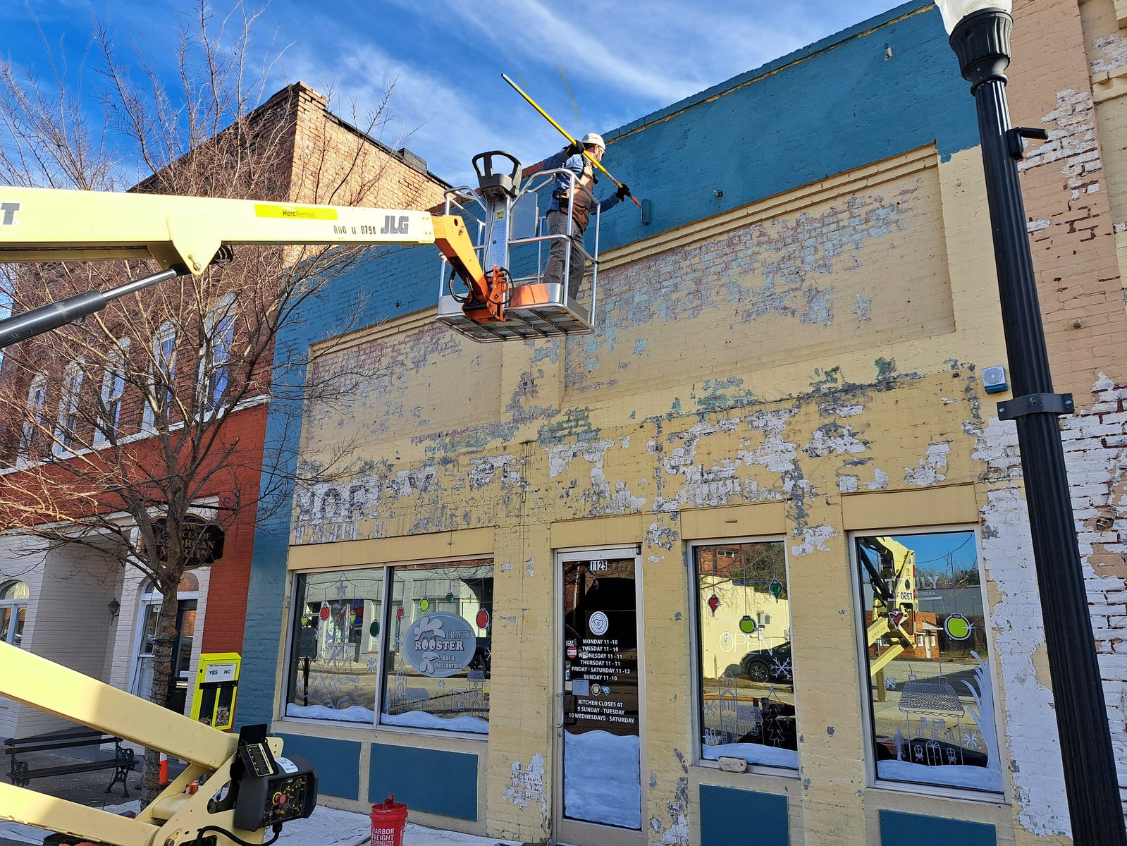 Downtown boom lift wall preparation