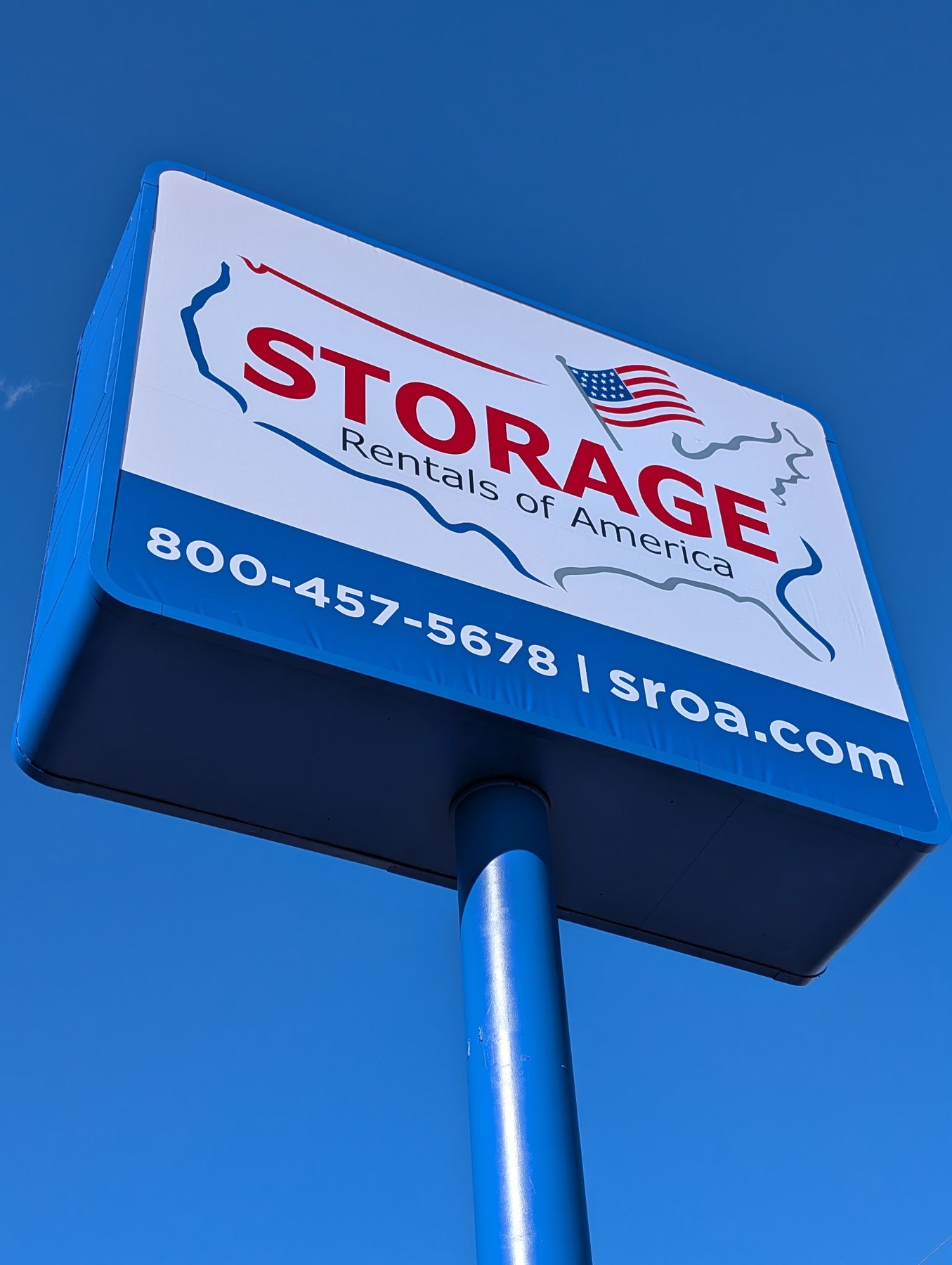 Storage facility pylon sign with illuminated cabinet