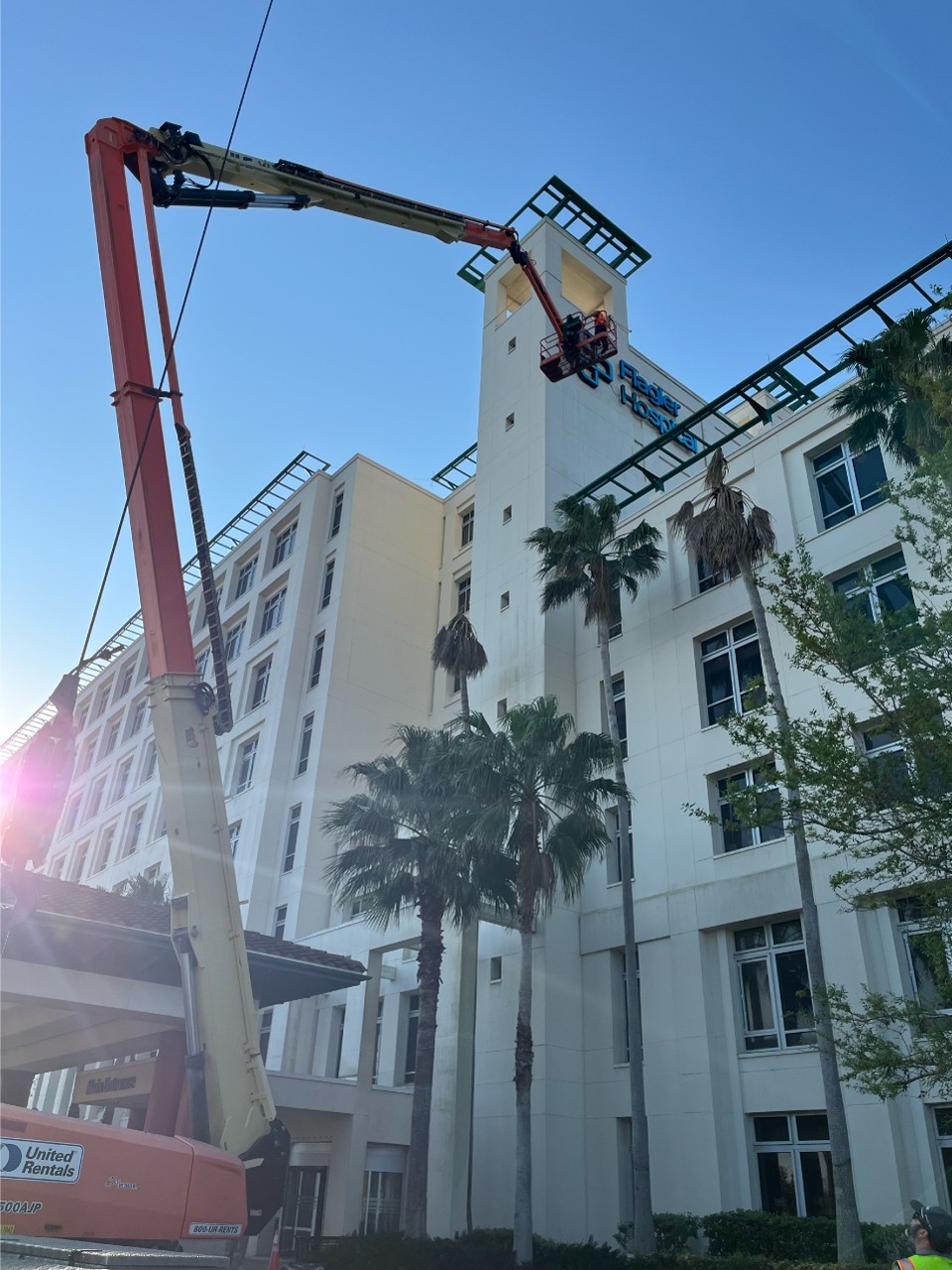 UF Health illuminated signs on high-rise building